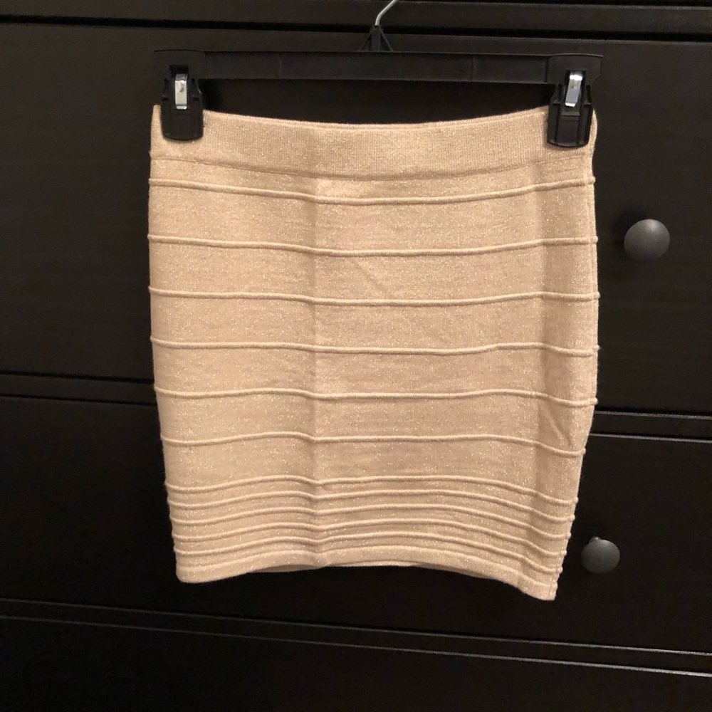 Light gold shimmery body con ribbed skirt